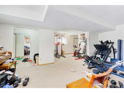210, 212 31 Avenue Ne, Calgary, AB - Indoor Photo Showing Gym Room