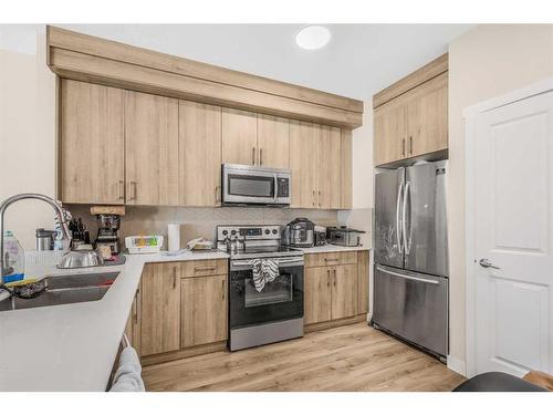 543 Cornerstone Avenue Ne, Calgary, AB - Indoor Photo Showing Kitchen With Double Sink