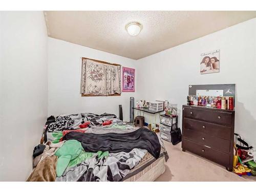 24 Carmel Place Ne, Calgary, AB - Indoor Photo Showing Bedroom