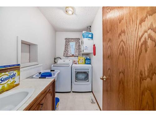 24 Carmel Place Ne, Calgary, AB - Indoor Photo Showing Laundry Room