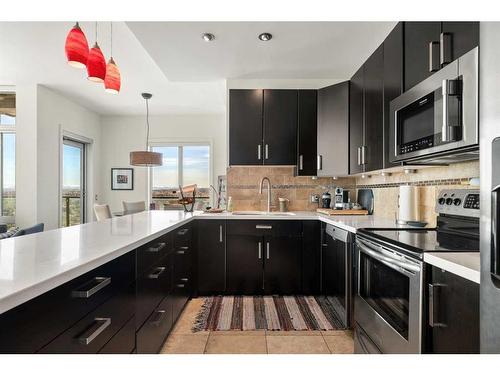 2306-1410 1 Street Se, Calgary, AB - Indoor Photo Showing Kitchen With Upgraded Kitchen