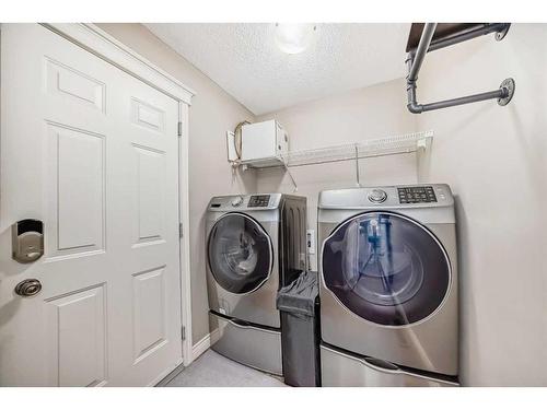 788 Luxstone Landing Sw, Airdrie, AB - Indoor Photo Showing Laundry Room