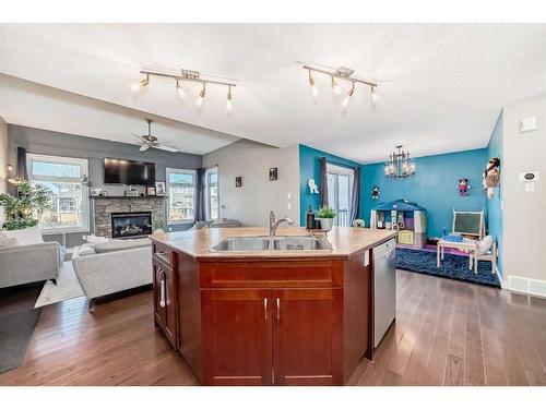 788 Luxstone Landing Sw, Airdrie, AB - Indoor With Fireplace