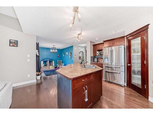 788 Luxstone Landing Sw, Airdrie, AB - Indoor Photo Showing Kitchen With Double Sink