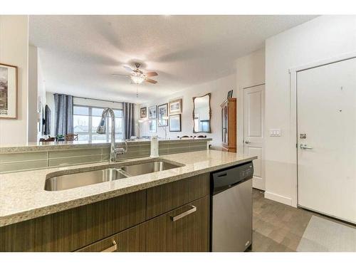 1312-175 Silverado Boulevard Sw, Calgary, AB - Indoor Photo Showing Kitchen With Double Sink