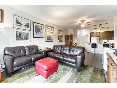 1312-175 Silverado Boulevard Sw, Calgary, AB - Indoor Photo Showing Living Room