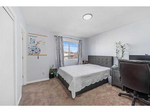 100 Country Hills Cove Nw, Calgary, AB - Indoor Photo Showing Bedroom