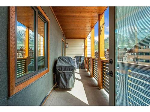 303-905 Spring Creek Drive, Canmore, AB - Outdoor With Deck Patio Veranda With Exterior