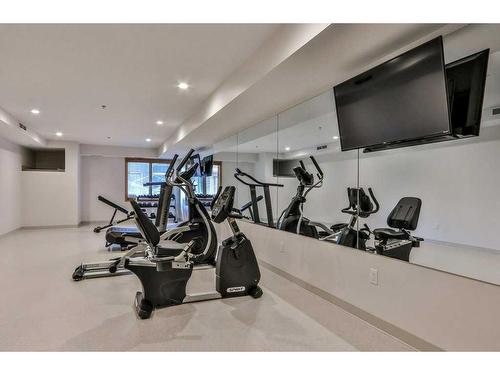 303-905 Spring Creek Drive, Canmore, AB - Indoor Photo Showing Gym Room