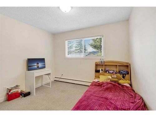 6131 Bowness Road Nw, Calgary, AB - Indoor Photo Showing Bedroom