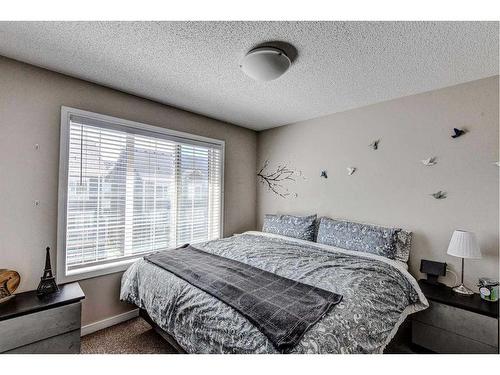 124 Marquis Lane Se, Calgary, AB - Indoor Photo Showing Bedroom