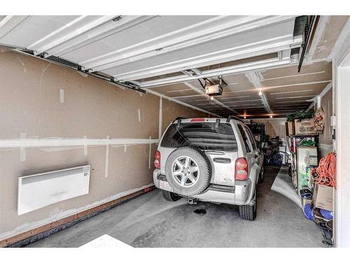 124 Marquis Lane Se, Calgary, AB - Indoor Photo Showing Garage