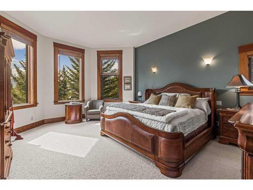 23 Juniper Ridge, Canmore, AB - Indoor Photo Showing Bedroom