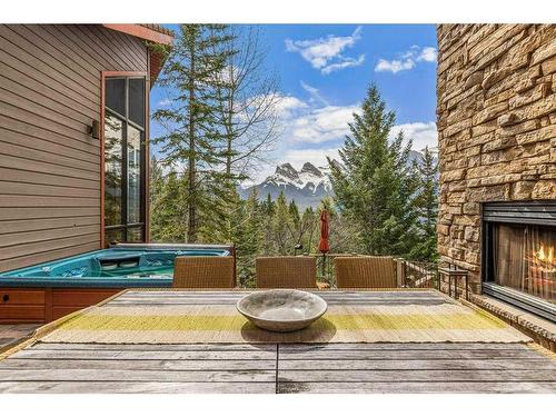 23 Juniper Ridge, Canmore, AB - Outdoor With Fireplace