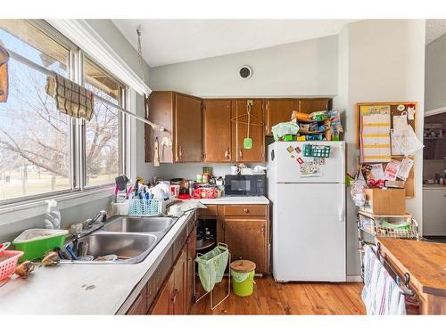 2619 & 2621 12 Avenue Se, Calgary, AB - Indoor Photo Showing Kitchen With Double Sink