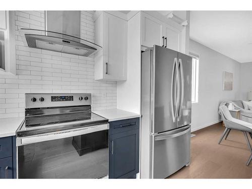 123 Aquila Way Nw, Calgary, AB - Indoor Photo Showing Kitchen With Stainless Steel Kitchen With Upgraded Kitchen