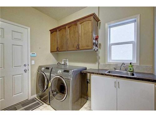 29 Pantego Road Nw, Calgary, AB - Indoor Photo Showing Laundry Room