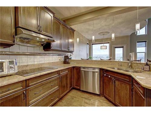 29 Pantego Road Nw, Calgary, AB - Indoor Photo Showing Kitchen With Double Sink