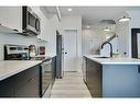 171 Creekstone Way Sw, Calgary, AB  - Indoor Photo Showing Kitchen With Stainless Steel Kitchen With Upgraded Kitchen 