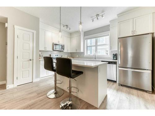 310 Cranbrook Walk Se, Calgary, AB - Indoor Photo Showing Kitchen With Stainless Steel Kitchen With Upgraded Kitchen