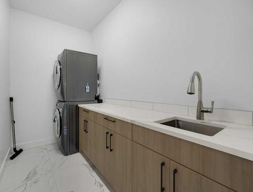 54 Malibou Road Sw, Calgary, AB - Indoor Photo Showing Laundry Room