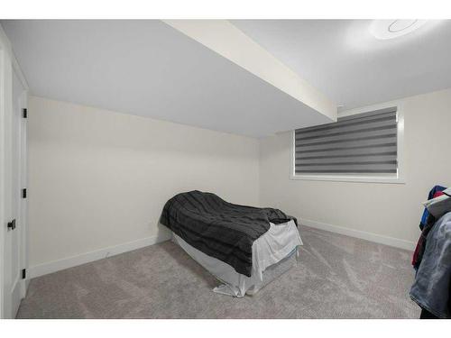 54 Malibou Road Sw, Calgary, AB - Indoor Photo Showing Bedroom