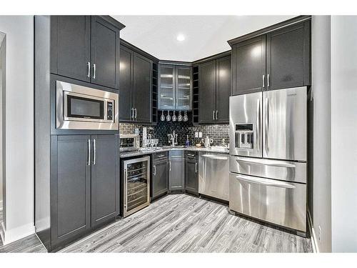 145 Silverado Crest Landing Sw, Calgary, AB - Indoor Photo Showing Kitchen With Upgraded Kitchen