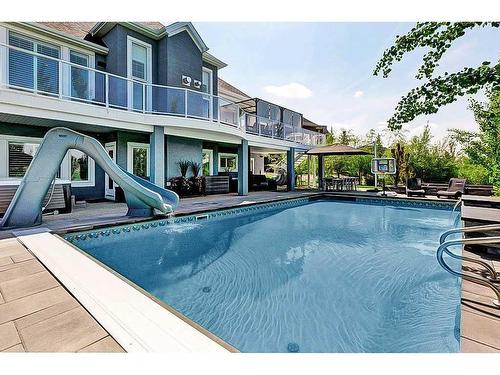 145 Silverado Crest Landing Sw, Calgary, AB - Outdoor With In Ground Pool