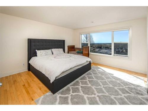 222 Tremblant Place Sw, Calgary, AB - Indoor Photo Showing Bedroom