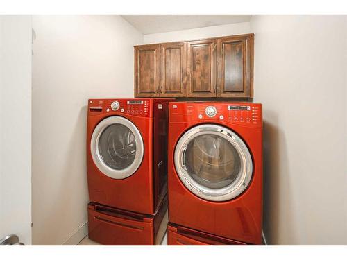 222 Tremblant Place Sw, Calgary, AB - Indoor Photo Showing Laundry Room