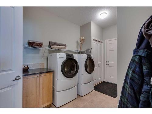 144 Westland Street, Okotoks, AB - Indoor Photo Showing Laundry Room