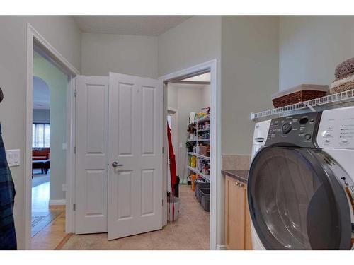 144 Westland Street, Okotoks, AB - Indoor Photo Showing Laundry Room