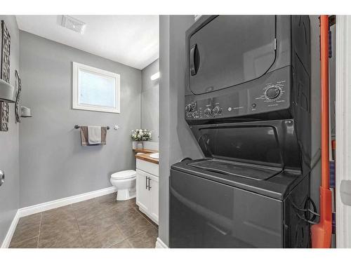 25 Tucker Circle, Okotoks, AB - Indoor Photo Showing Laundry Room