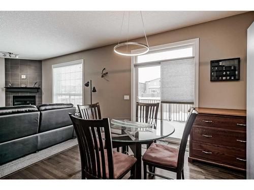 161 Rainbow Falls Heath, Chestermere, AB - Indoor Photo Showing Other Room With Fireplace
