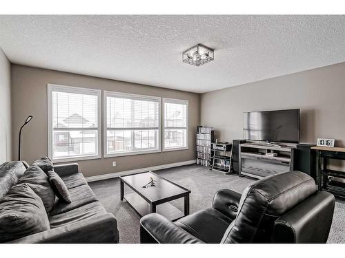 161 Rainbow Falls Heath, Chestermere, AB - Indoor Photo Showing Living Room