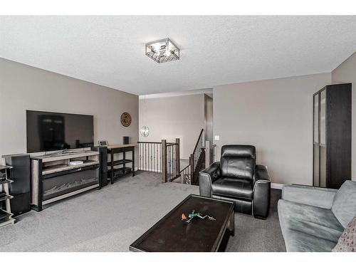 161 Rainbow Falls Heath, Chestermere, AB - Indoor Photo Showing Living Room