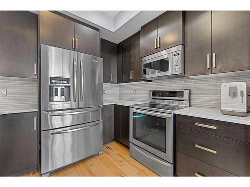 153 Marquis Point Se, Calgary, AB - Indoor Photo Showing Kitchen With Upgraded Kitchen