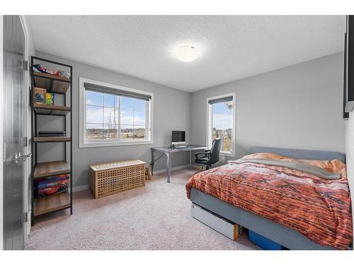 153 Marquis Point Se, Calgary, AB - Indoor Photo Showing Bedroom