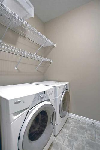 113 Seagreen Manor, Chestermere, AB - Indoor Photo Showing Laundry Room