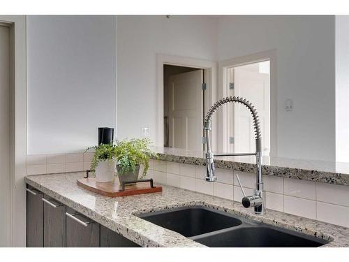 612-3410 20 Street Sw, Calgary, AB - Indoor Photo Showing Kitchen With Double Sink