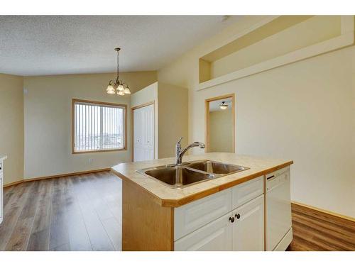 182 Panatella Circle Nw, Calgary, AB - Indoor Photo Showing Kitchen With Double Sink