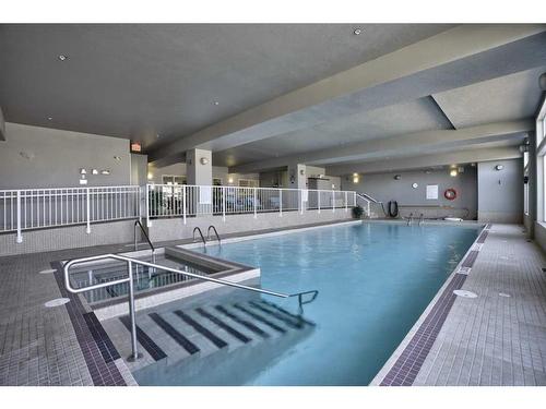 103-15 Everstone Drive Sw, Calgary, AB - Indoor Photo Showing Other Room With In Ground Pool