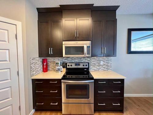 1603 Monteith Drive Se, High River, AB - Indoor Photo Showing Kitchen