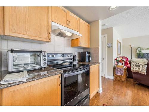 404 Rainbow Falls Way, Chestermere, AB - Indoor Photo Showing Kitchen