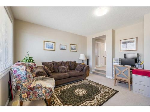 404 Rainbow Falls Way, Chestermere, AB - Indoor Photo Showing Living Room