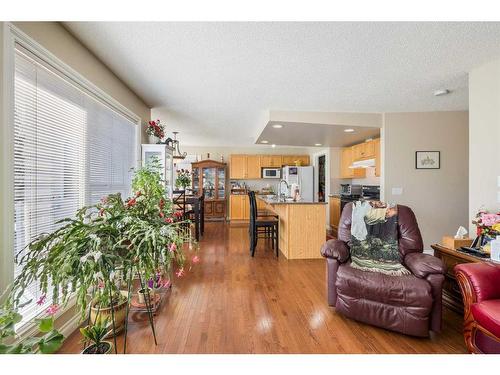 404 Rainbow Falls Way, Chestermere, AB - Indoor Photo Showing Living Room