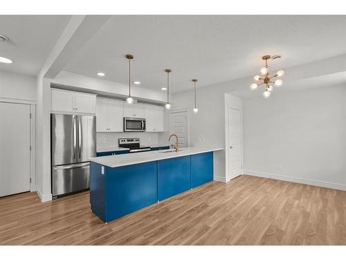 #75-230 Seton Passage Passage Se, Calgary, AB - Indoor Photo Showing Kitchen With Upgraded Kitchen