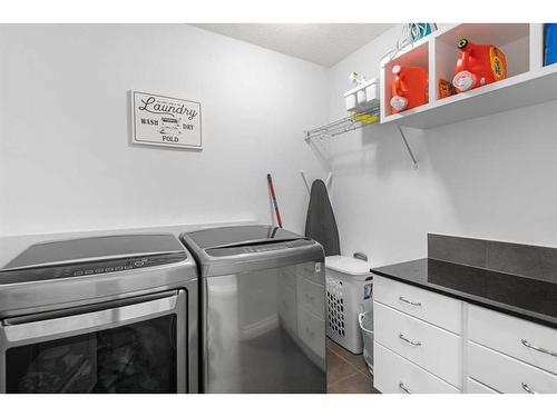 110 Cranleigh Way Se, Calgary, AB - Indoor Photo Showing Laundry Room