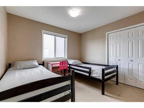 321 Bridleridge View Sw, Calgary, AB - Indoor Photo Showing Bedroom