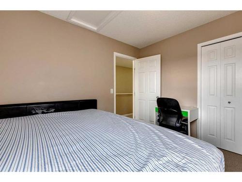 321 Bridleridge View Sw, Calgary, AB - Indoor Photo Showing Bedroom